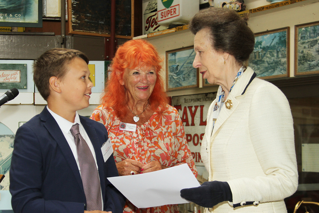 Henry Dukes accepts his award from HRH Princess Anne, the Trust's Patron and Judy, Lady McAlpine, the Trusts's President